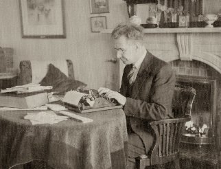 Very early picture of Brother W. N. Woodworth at his typewriter